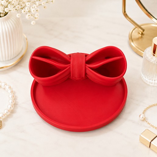 Bow Beauty Organizer Tray seen from above, showing the bow compartments and round tray